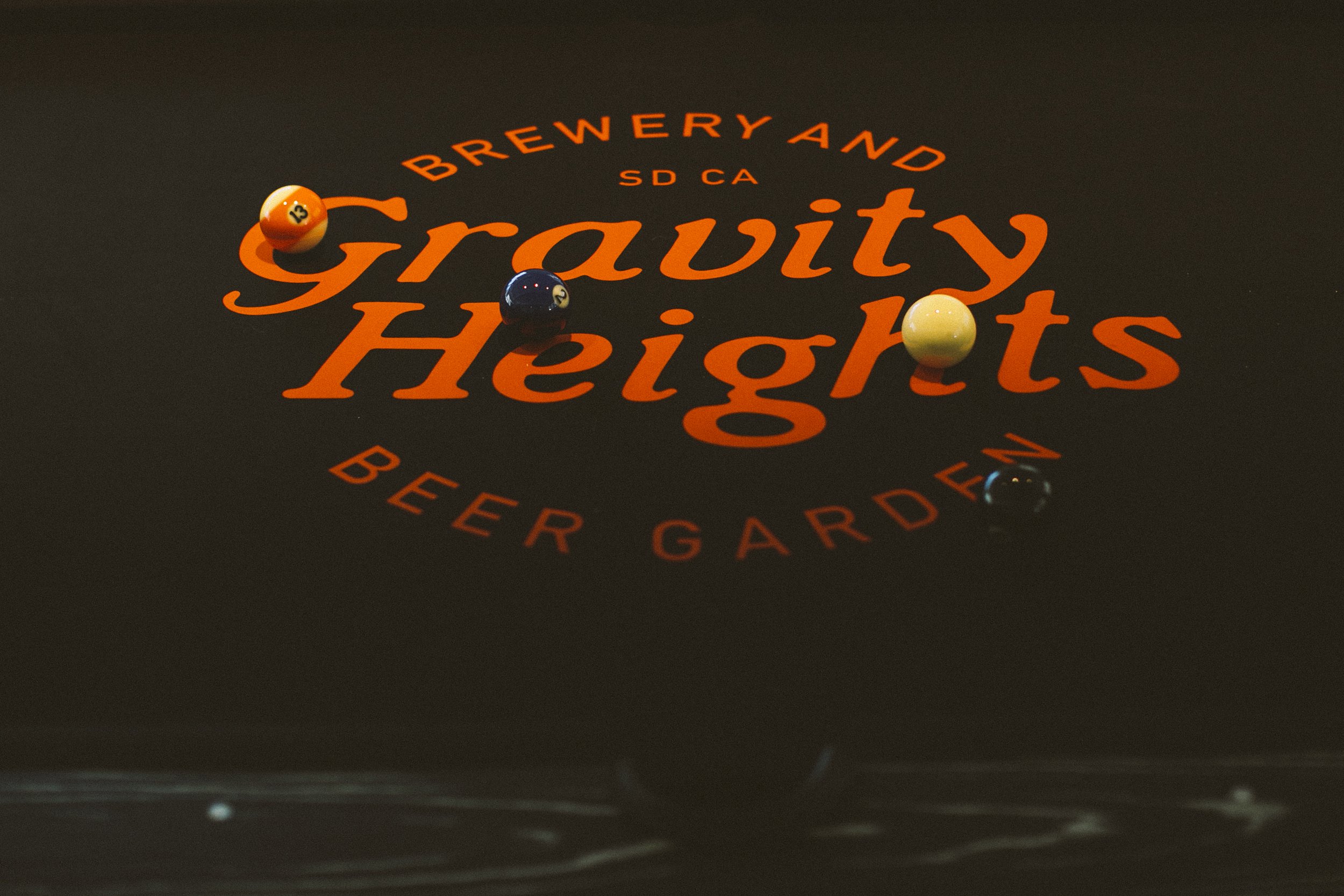 Gravity Heights logo in lights. 