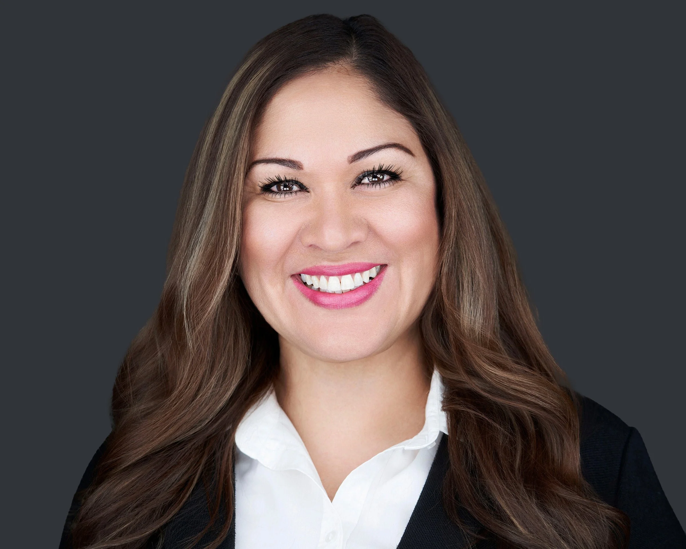 Professional Corporate Headshot of Female in White Blouse and Black Blazer