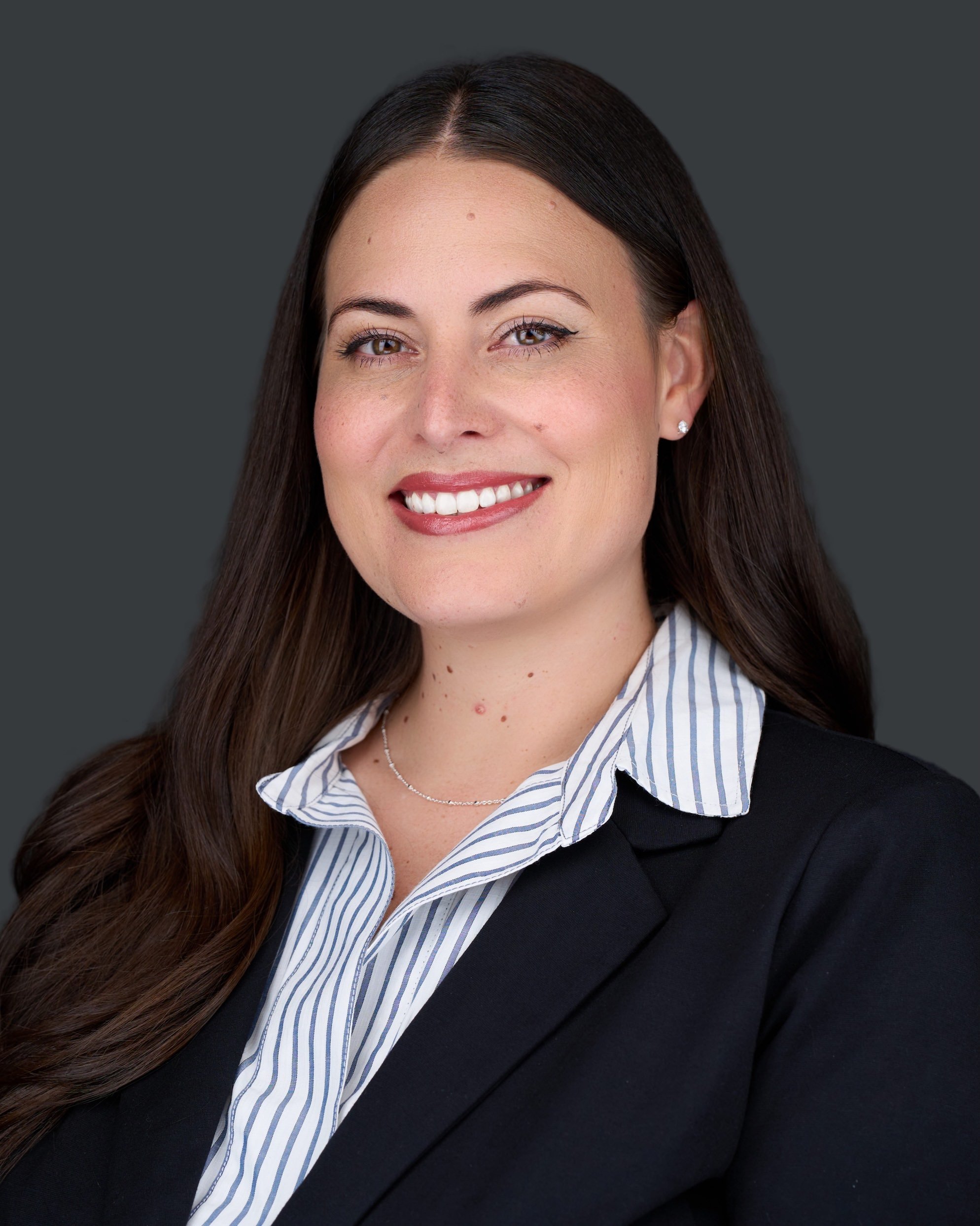 Profession headshot of Woman in black blazer in Westminster CO.