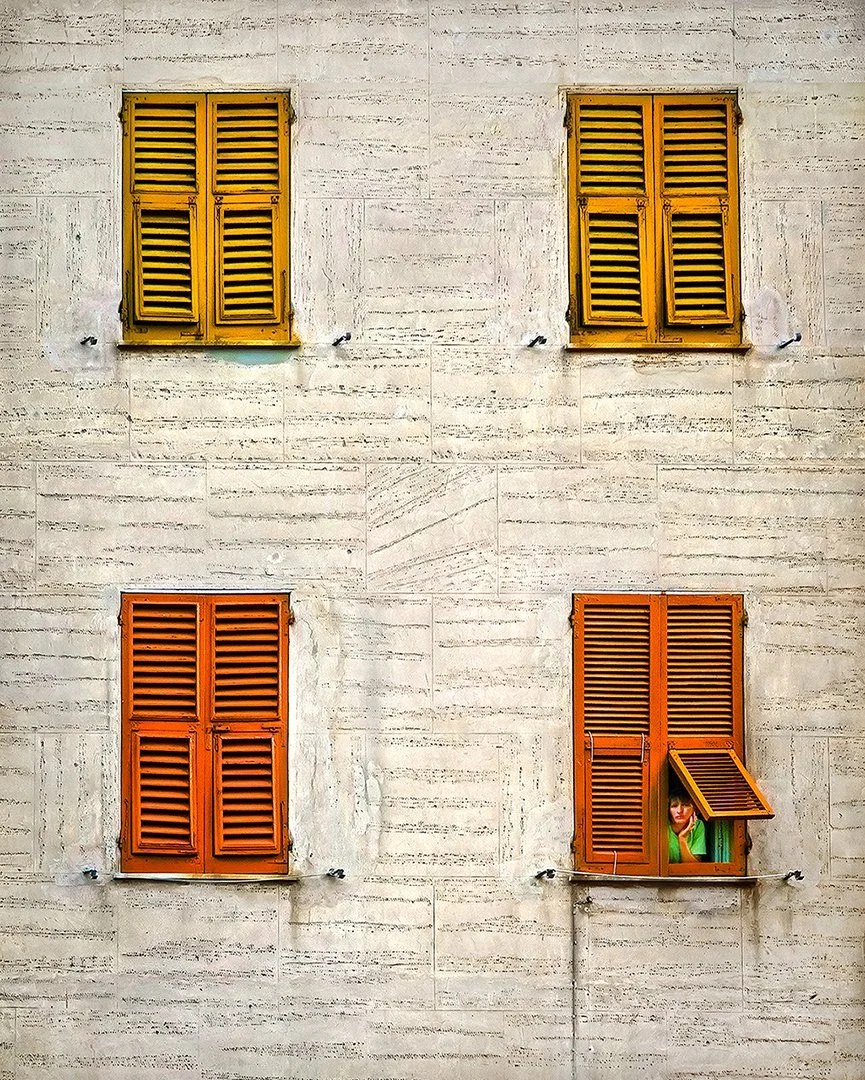 Woman in window  -  Monterosso - Cinque Terre, Italy  2008
