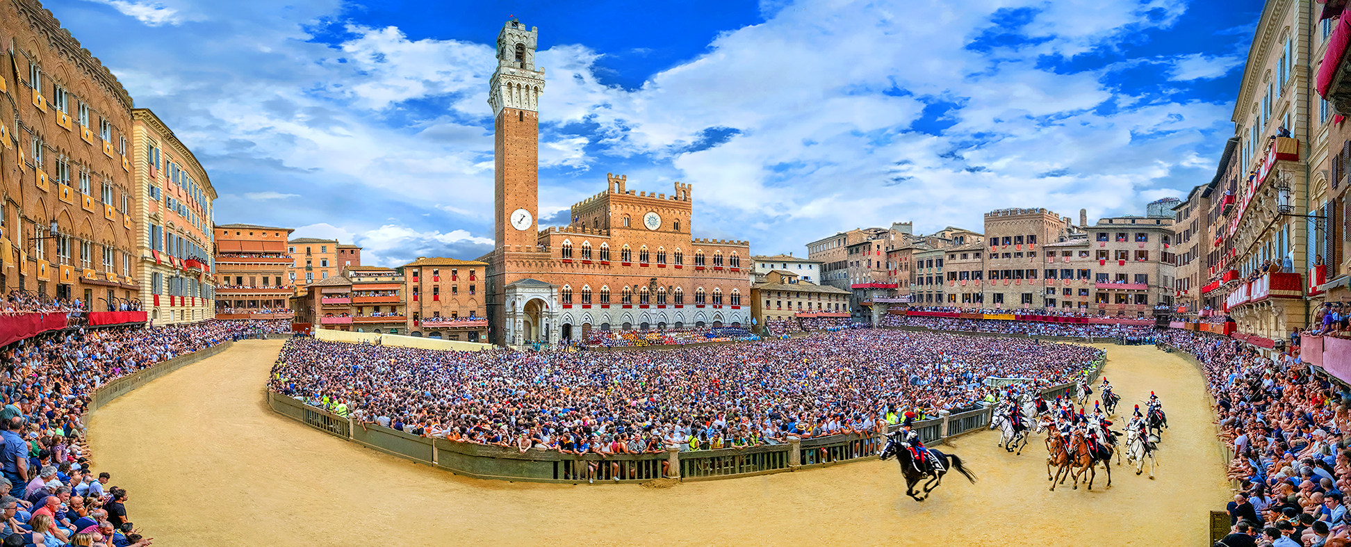 Running of the Palio di Provenzano Horse race - Carabinieri Policia ceremonial charge with sabers drawn before start of the race - Siena, Italy 2024