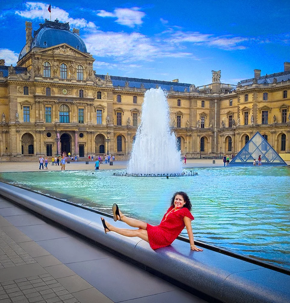 Woman in Red Dress & the fountain - Musée du Louvre - Paris, France. 2008