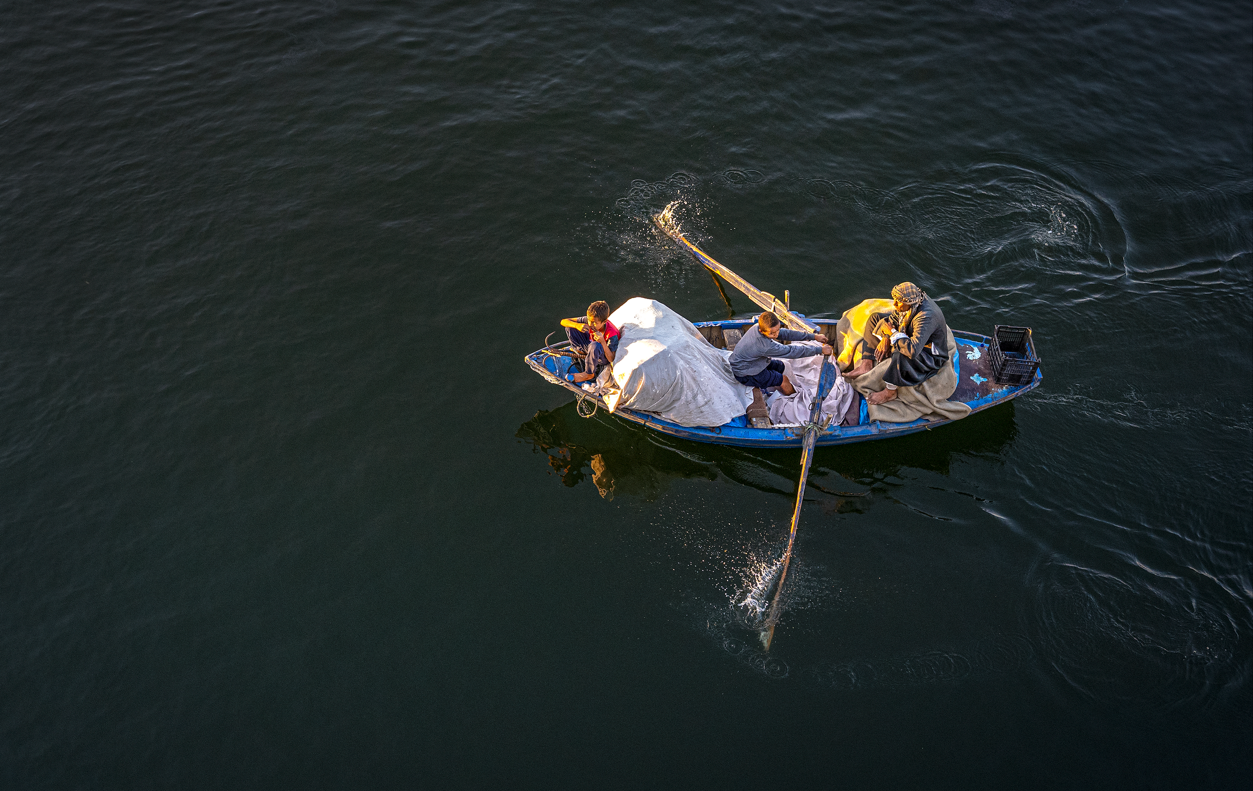 Family transporting goods on the Nile  -  Luxor, Egypt  2024