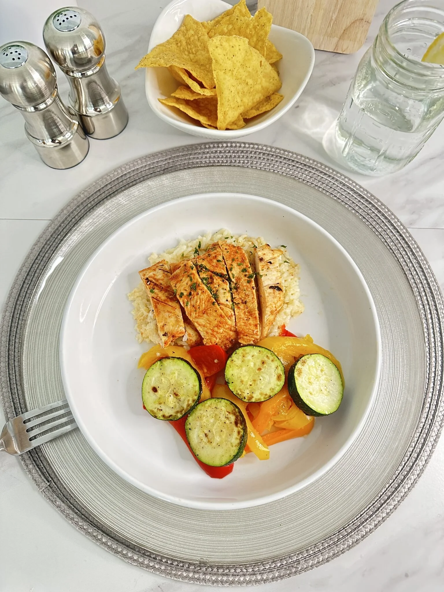 Chicken breast, jasmine rice, and bell peppers