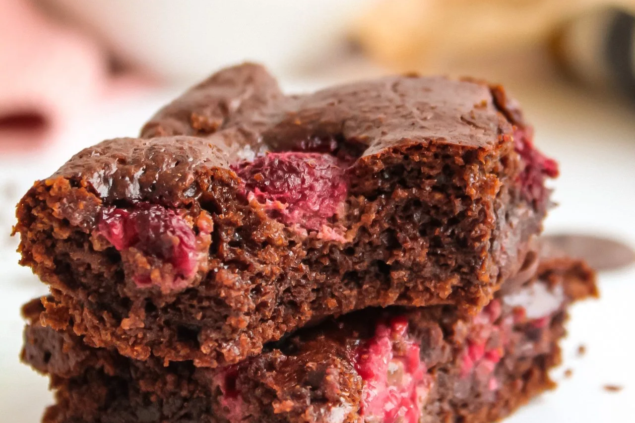 Fudgy nut-free tahini brownies made with cocoa, dark chocolate chips and flaky sea salt.