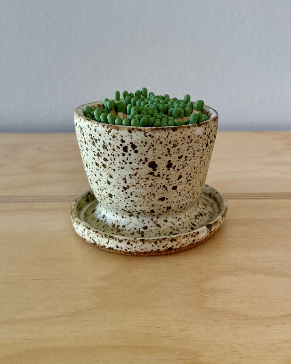 white speckled match holder