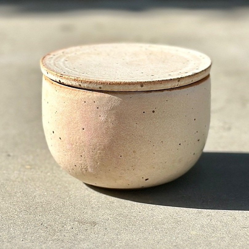 creamy white lidded pot