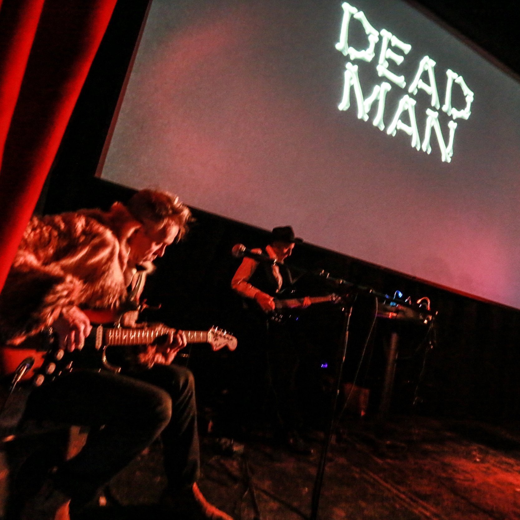  The Paper Flowers (Brian Kelly, Irman Peck &amp; Daniel Cousins) performing a re-scoring of Jim Jarmusch's 'Dead Man' at the House of Yes, with Little Cinema.  