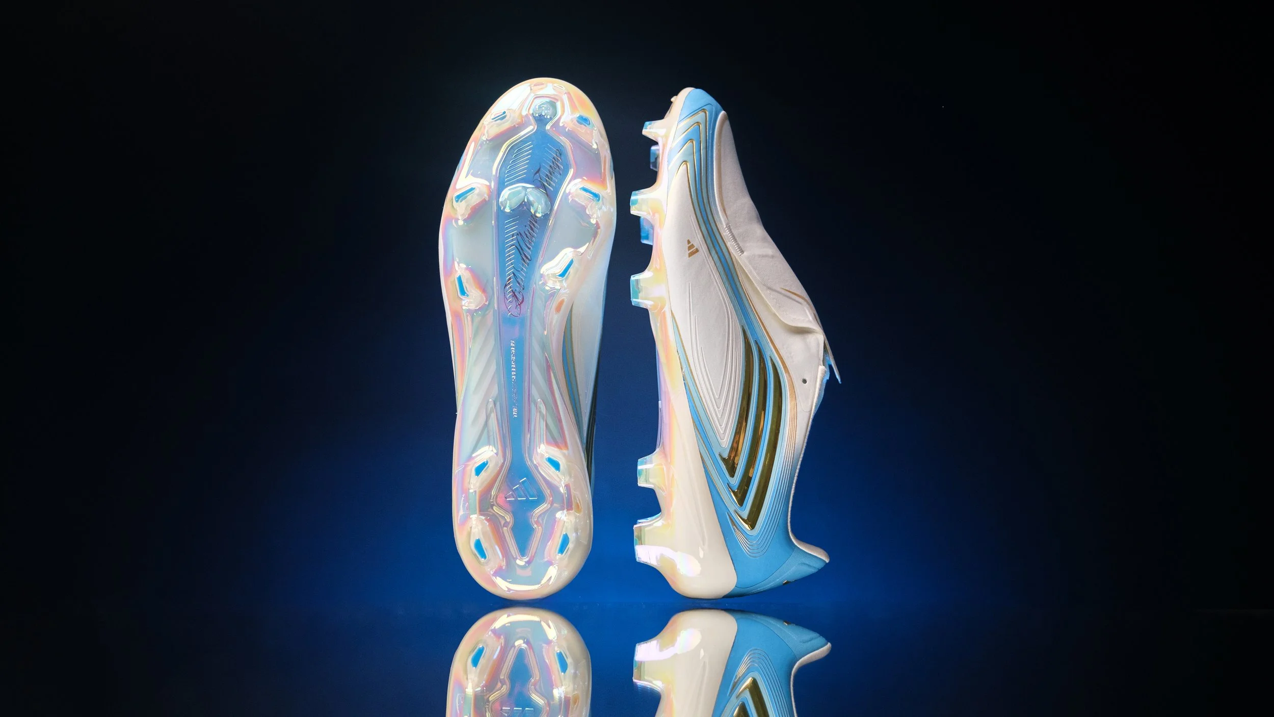 A pair of iridescent, futuristic athletic shoes with sleek design and reflective surfaces, set against a dark background.