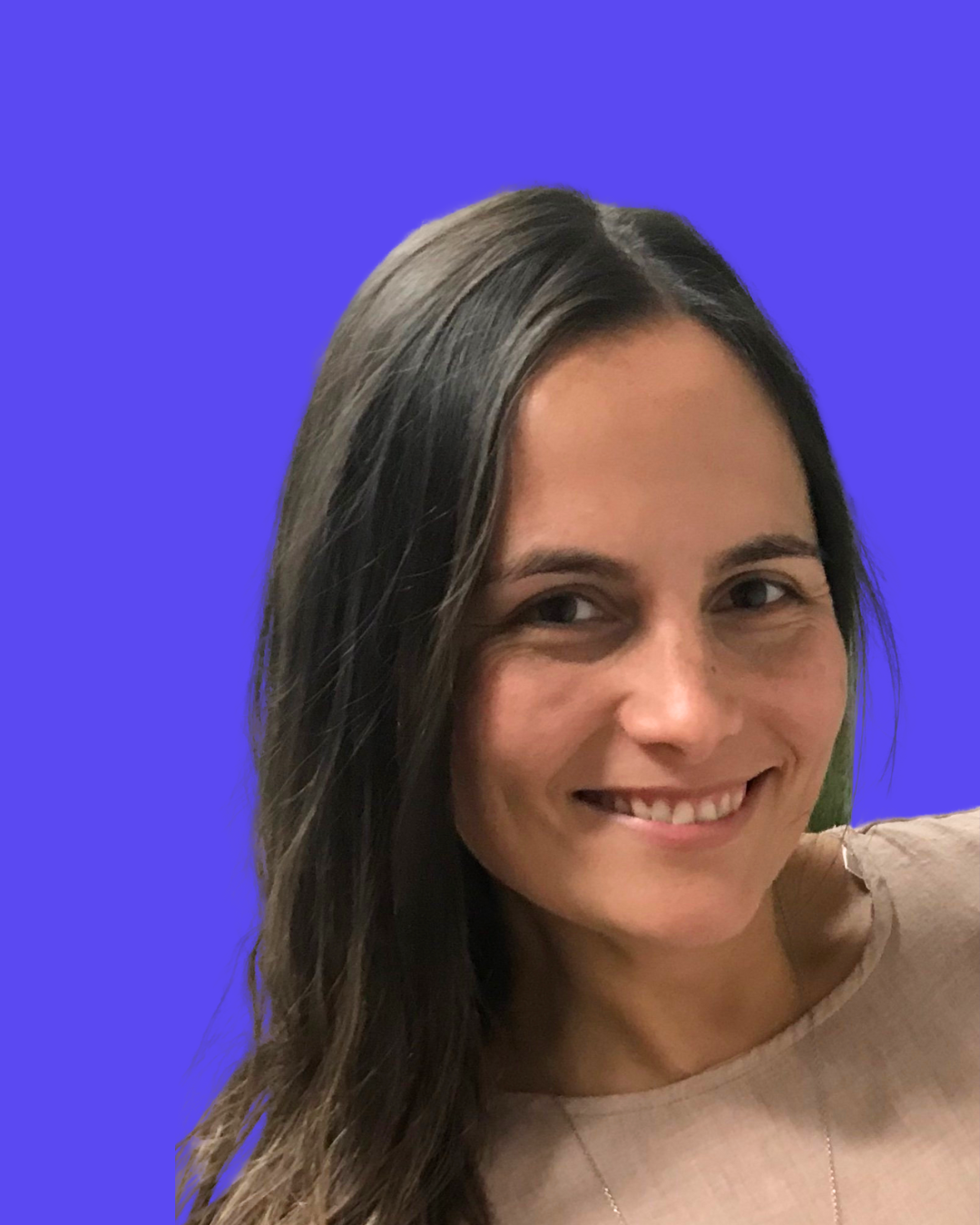 Close-up of a woman smiling with long dark hair, wearing a beige top, against a bright blue background.