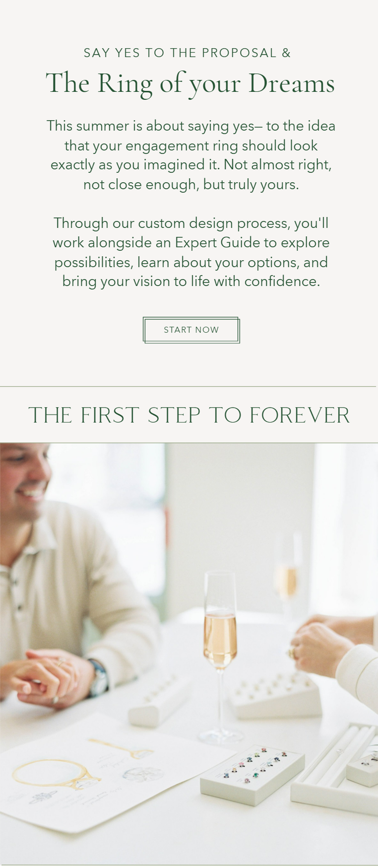A person at a table with jewelry sketches, a white box of colorful gemstones, and two glasses of champagne, engaging in a jewelry design consultation.