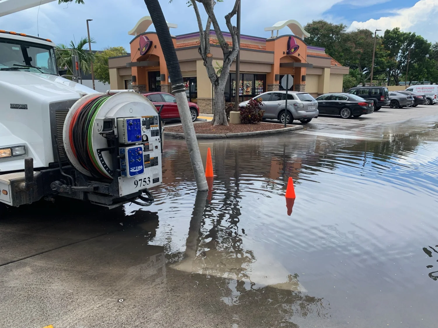 Flooded Parking Lot Drain Cleaning | Vac Truck Services in Broward ...