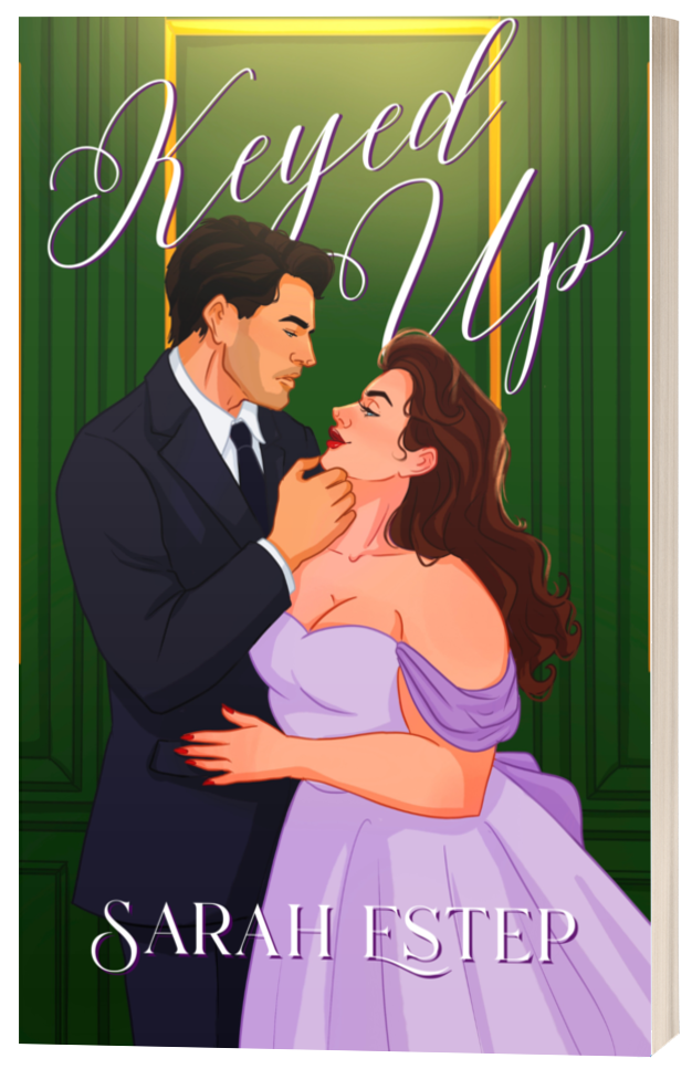 Book cover featuring a romantic illustration of a man and woman gazing into each other's eyes, with the title 'Keyed Up' and the author's name Sarah Estep.