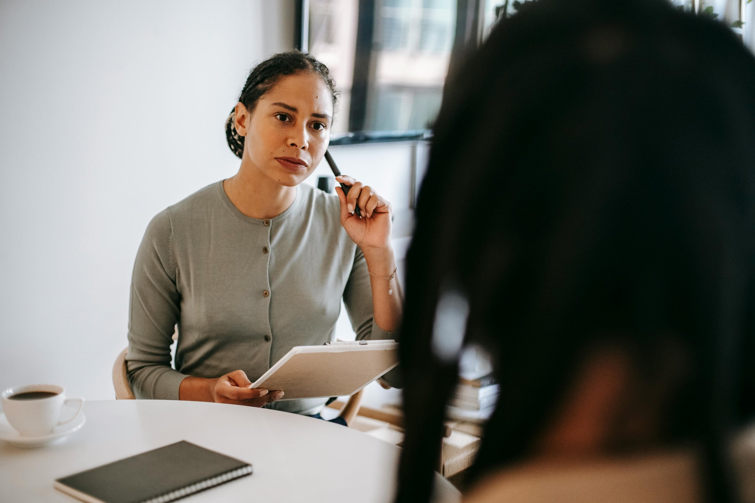 Stock photo of a women talking with an advisor