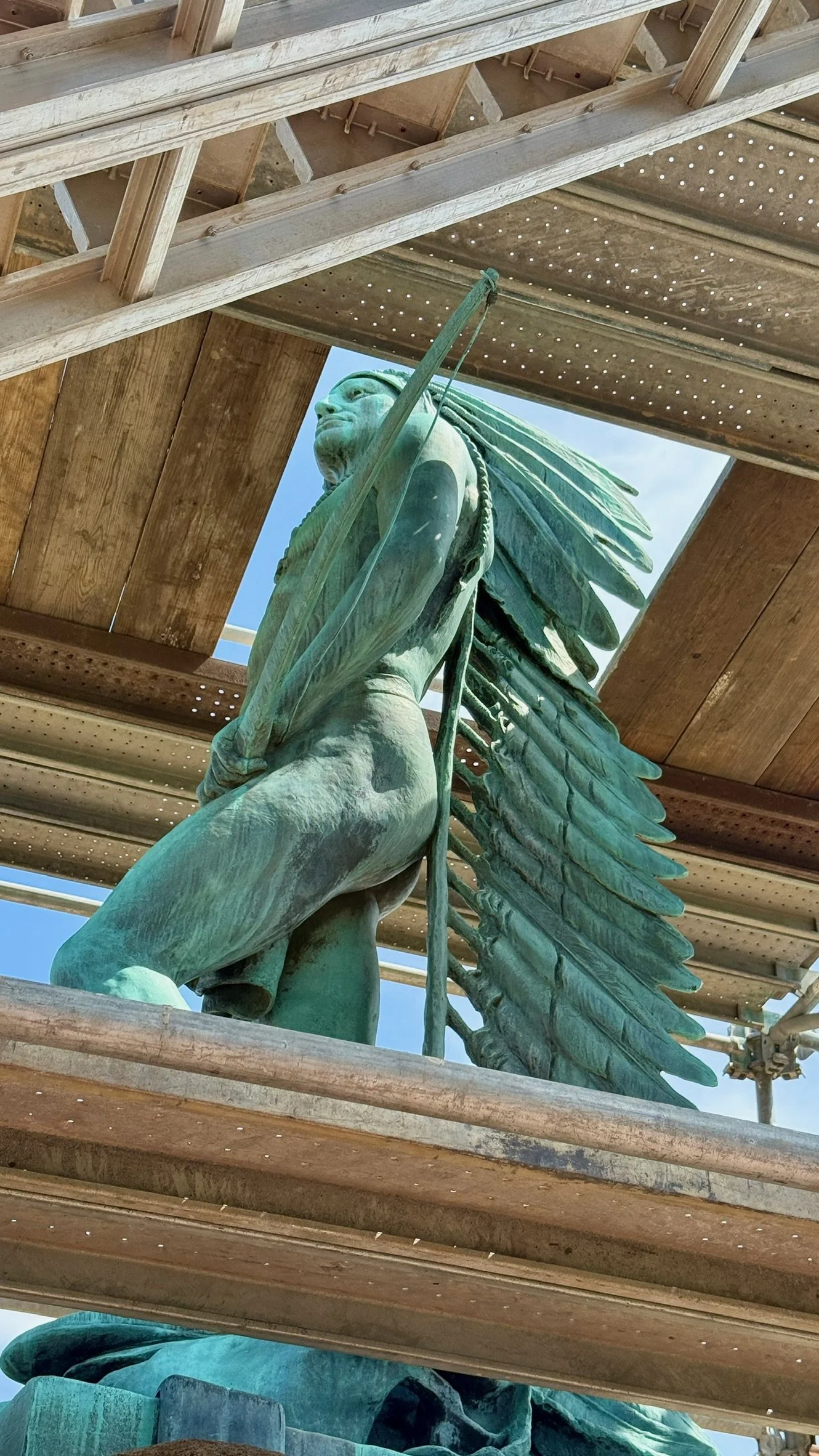 The Passing of the Buffalo statue during restoration