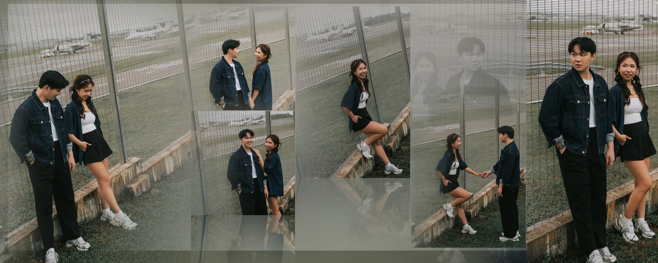 A young man and woman standing near a chain-link fence at an airport, engaging in conversation and smiling, with airplanes visible in the background.