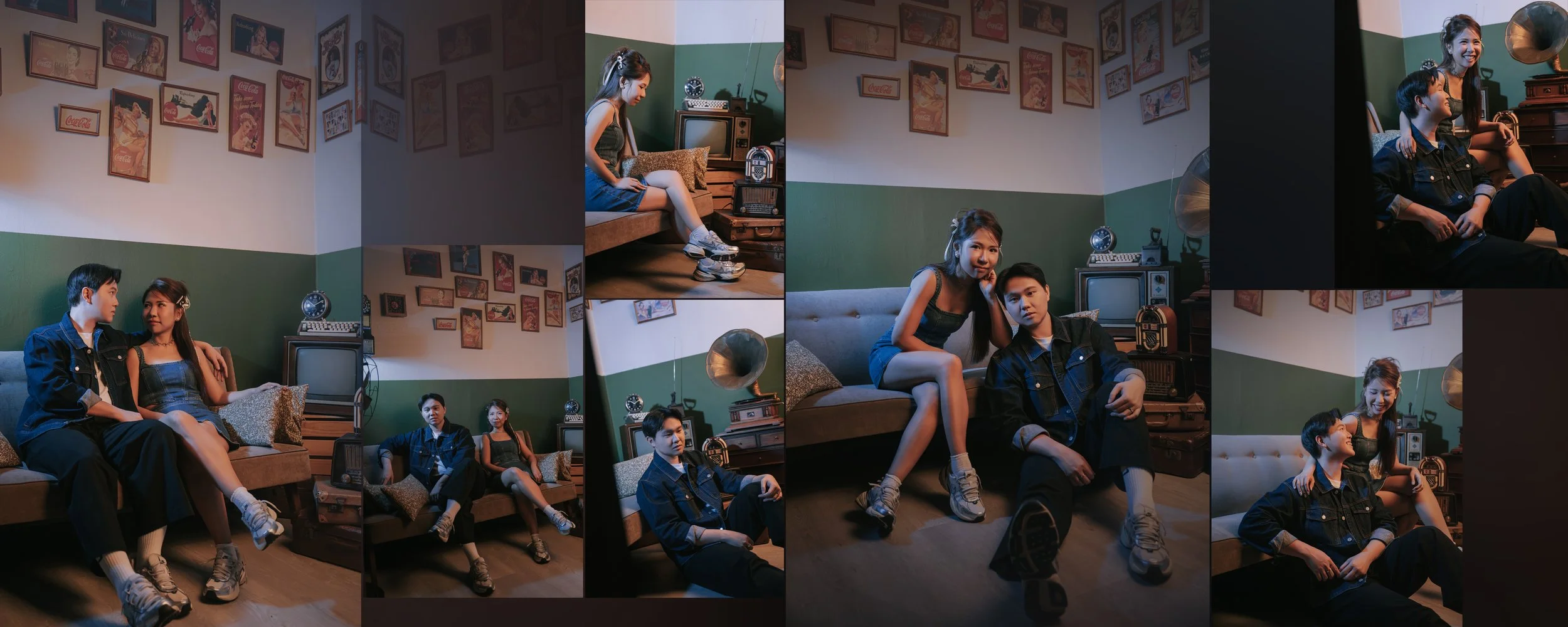 Two young people, a girl and a boy, sitting on a vintage-style sofa in a decorated room with wall art, a gramophone, and a retro television, smiling and looking at each other.