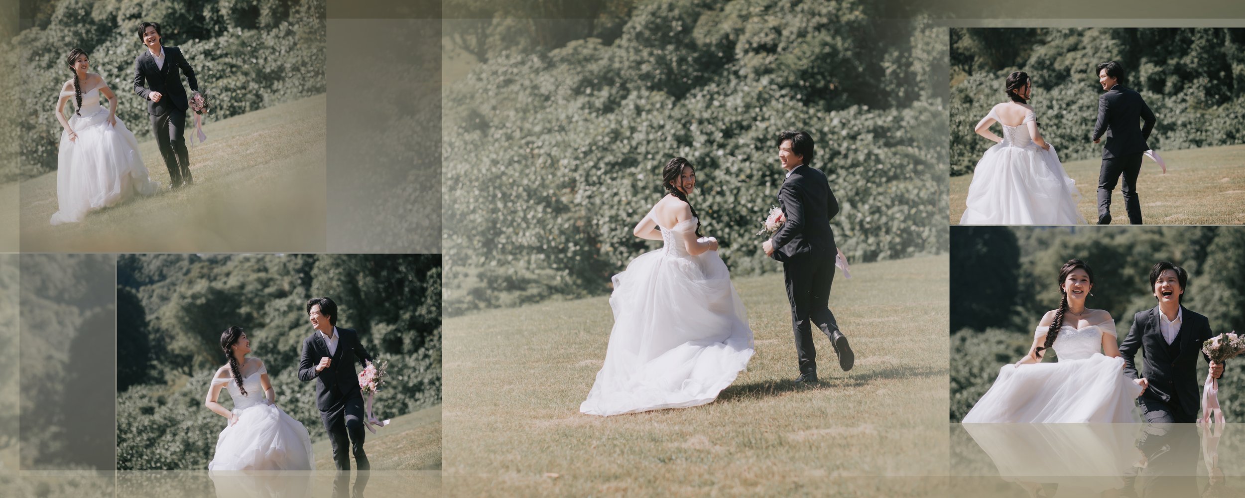 A wedding couple, a bride and groom, walking and playing on a grassy field with trees in the background. The bride is in a white wedding gown with long dark hair in braids, and the groom is in a dark suit with dark hair. They are smiling and holding 