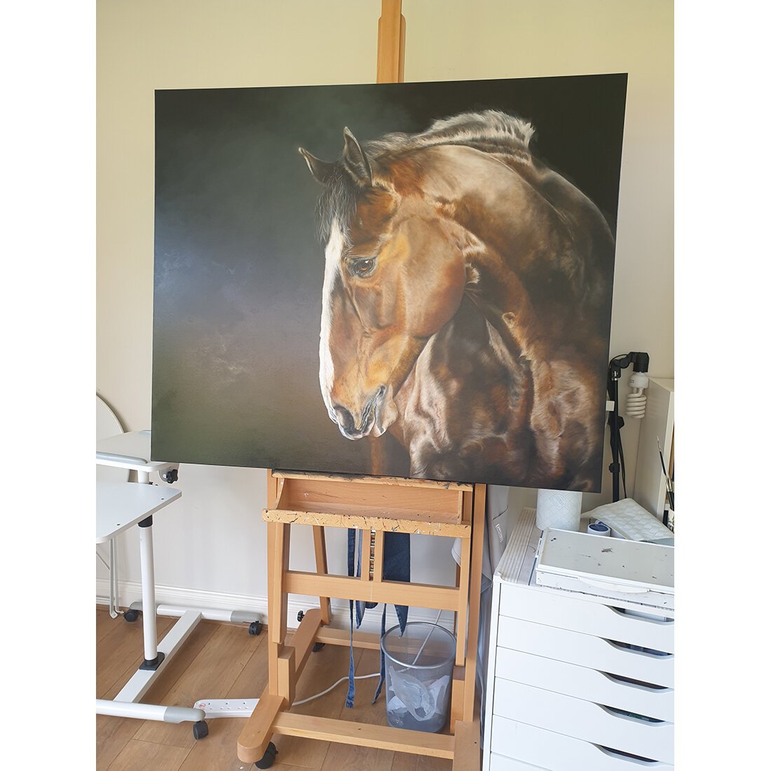 Police Horse MERLIN, oil on canvas painting in progress by artist Nikki Carr - sitting on easel in artist studio
