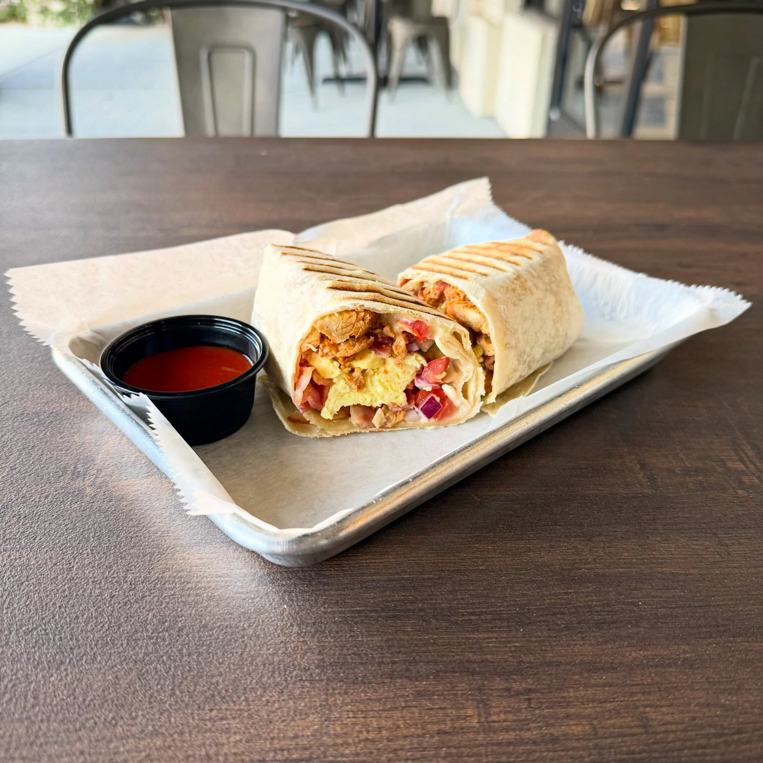 NEW!! 

The Fajita Burrito
- Fajita Chicken 
- Bacon 
- Scrambled Eggs 
- Pico de Gallo
- Pepper Jack Cheese