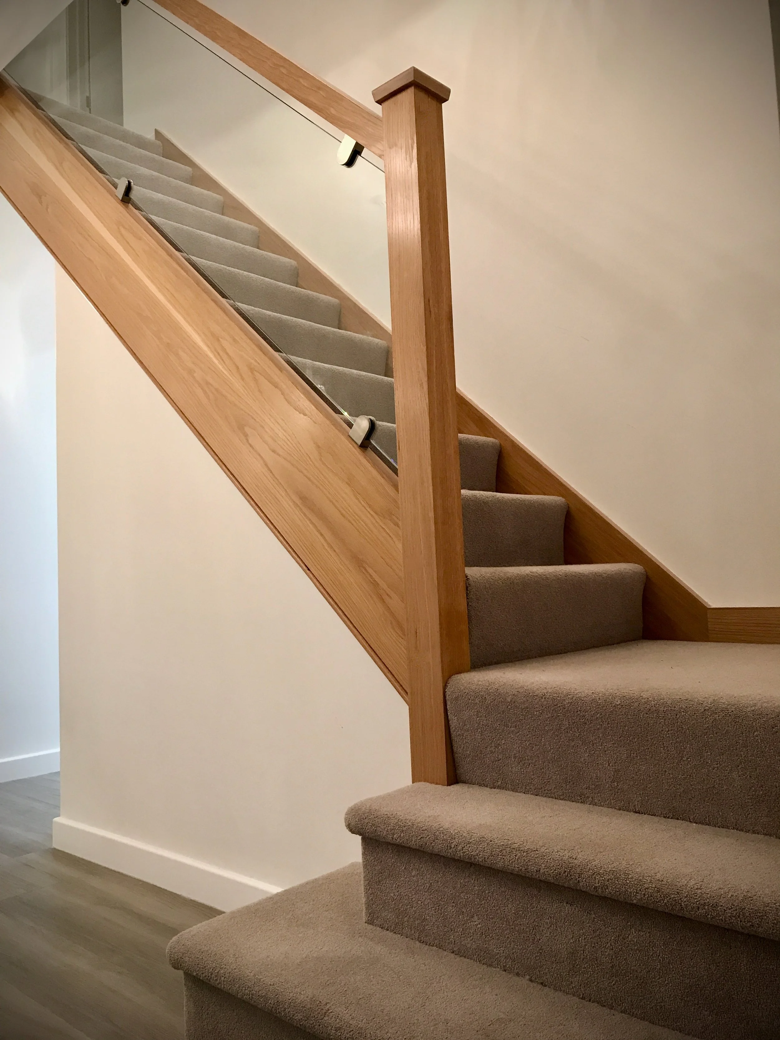 Modern Oak staircase with glass balustrades Berkshire