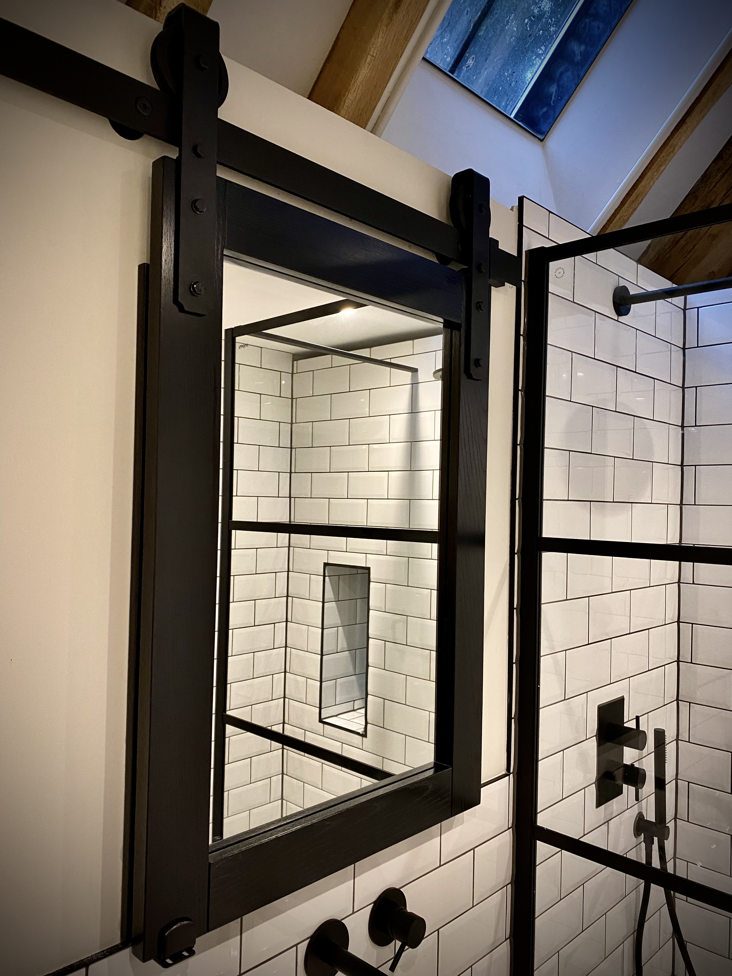 Sliding mirrors with bathroom storage
