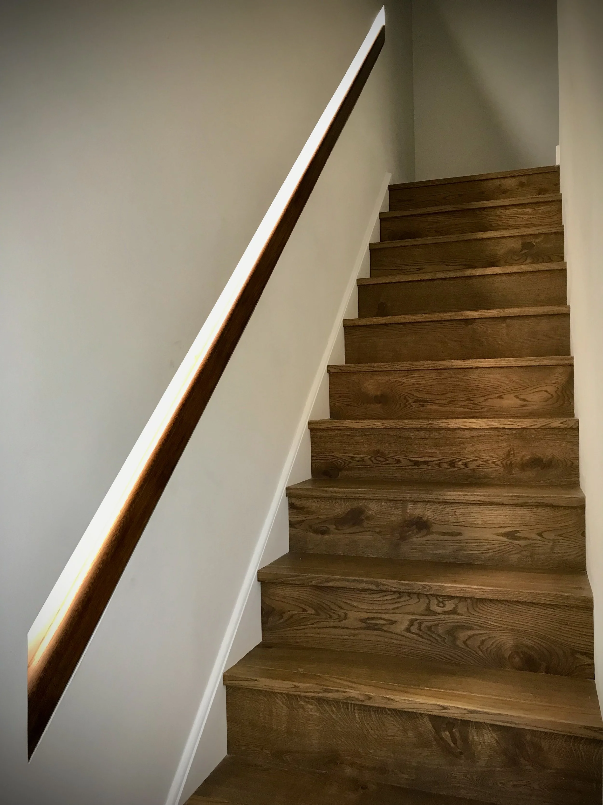 Modern staircase with sunken wall mounted handrail Berkshire 