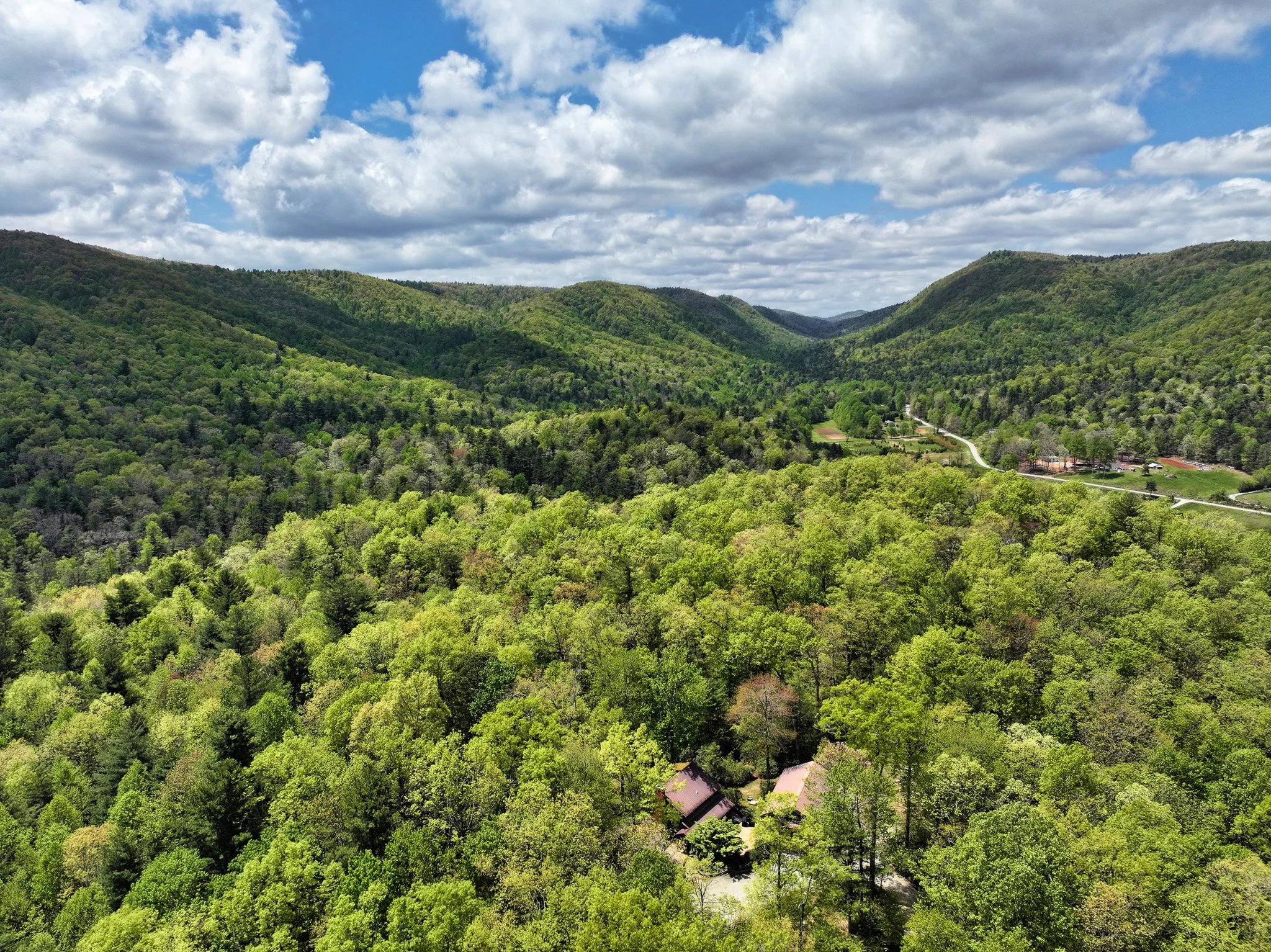 Aerial view of the home and 8.83 acres
