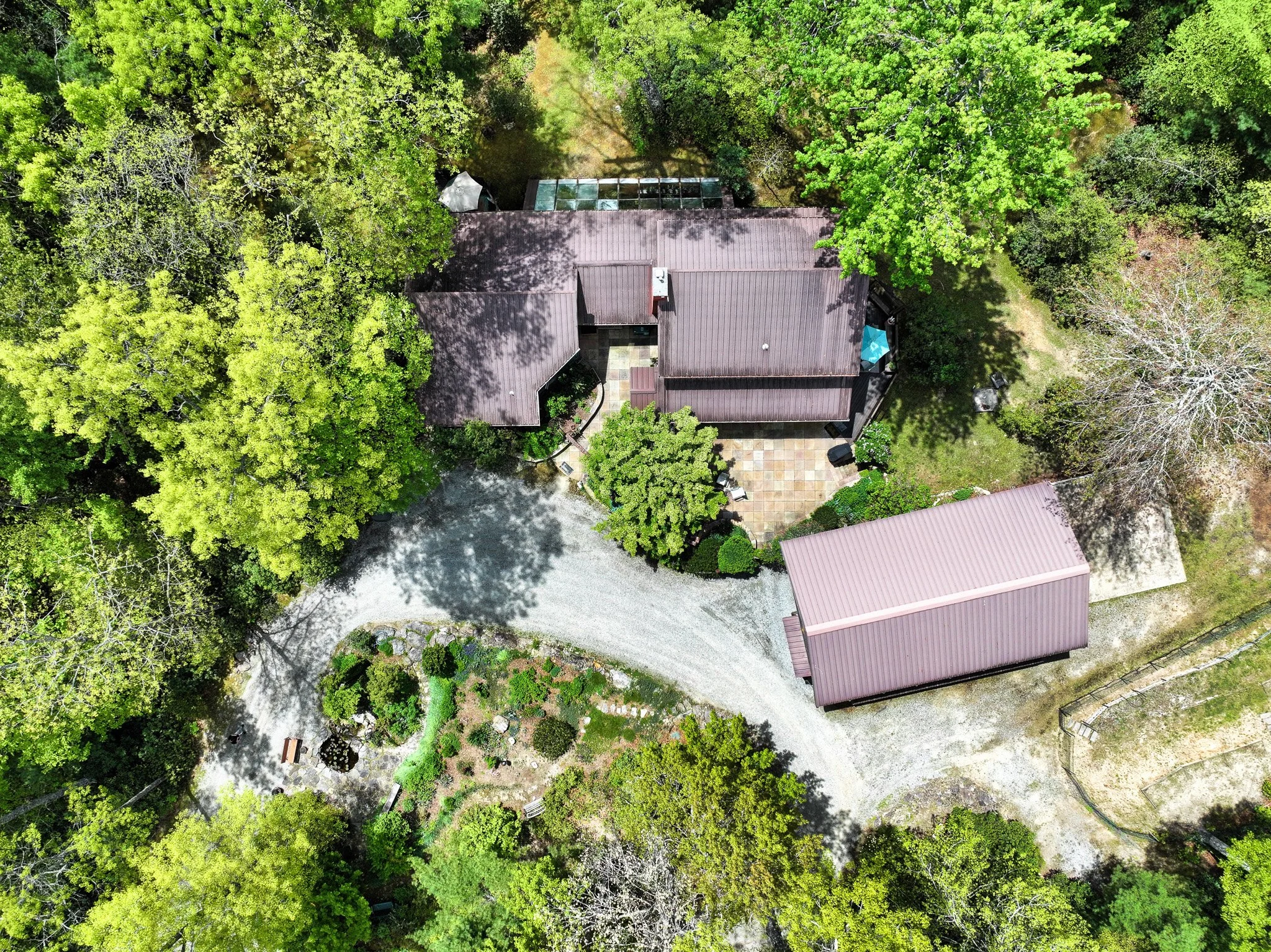Aerial of main house and separate brick building