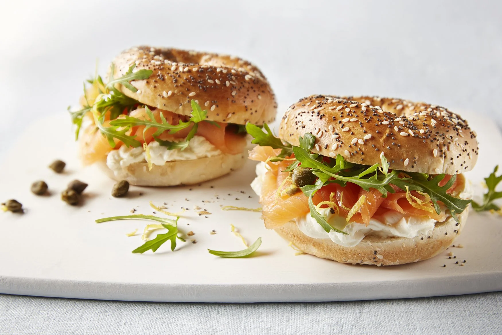 01.Philadelphia & salmon bagels on white board_Malou Burger2.jpg