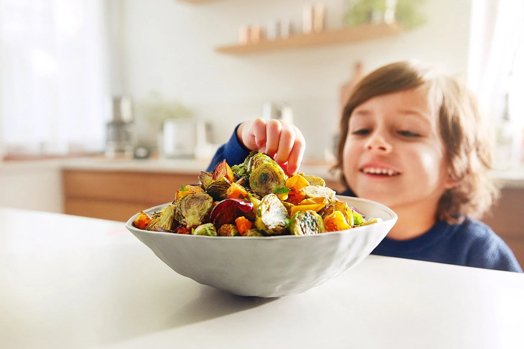 Boy_Stealing_BrussleSprout_Electrolux_Malou_Burger (1).jpg