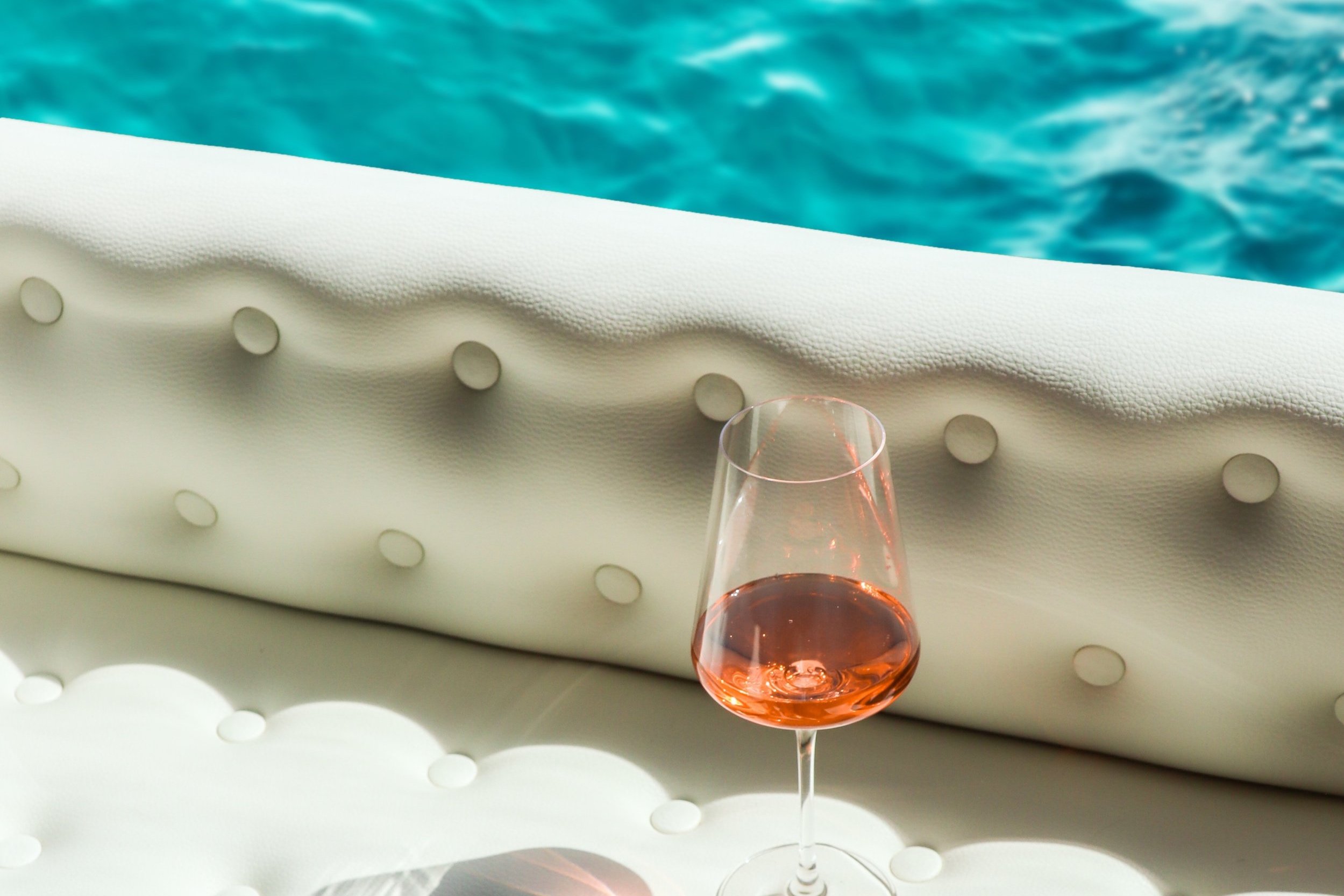 Single wine glass on a boat