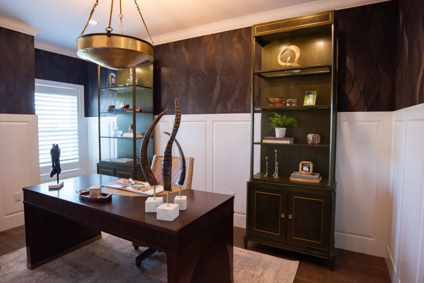 One room. A dramatic transformation.

This one room makeover took a heavy, dated space and turned it into a moody, sophisticated office through curated furnishings, statement lighting, and intentional finishes.

We offer individual room update servic