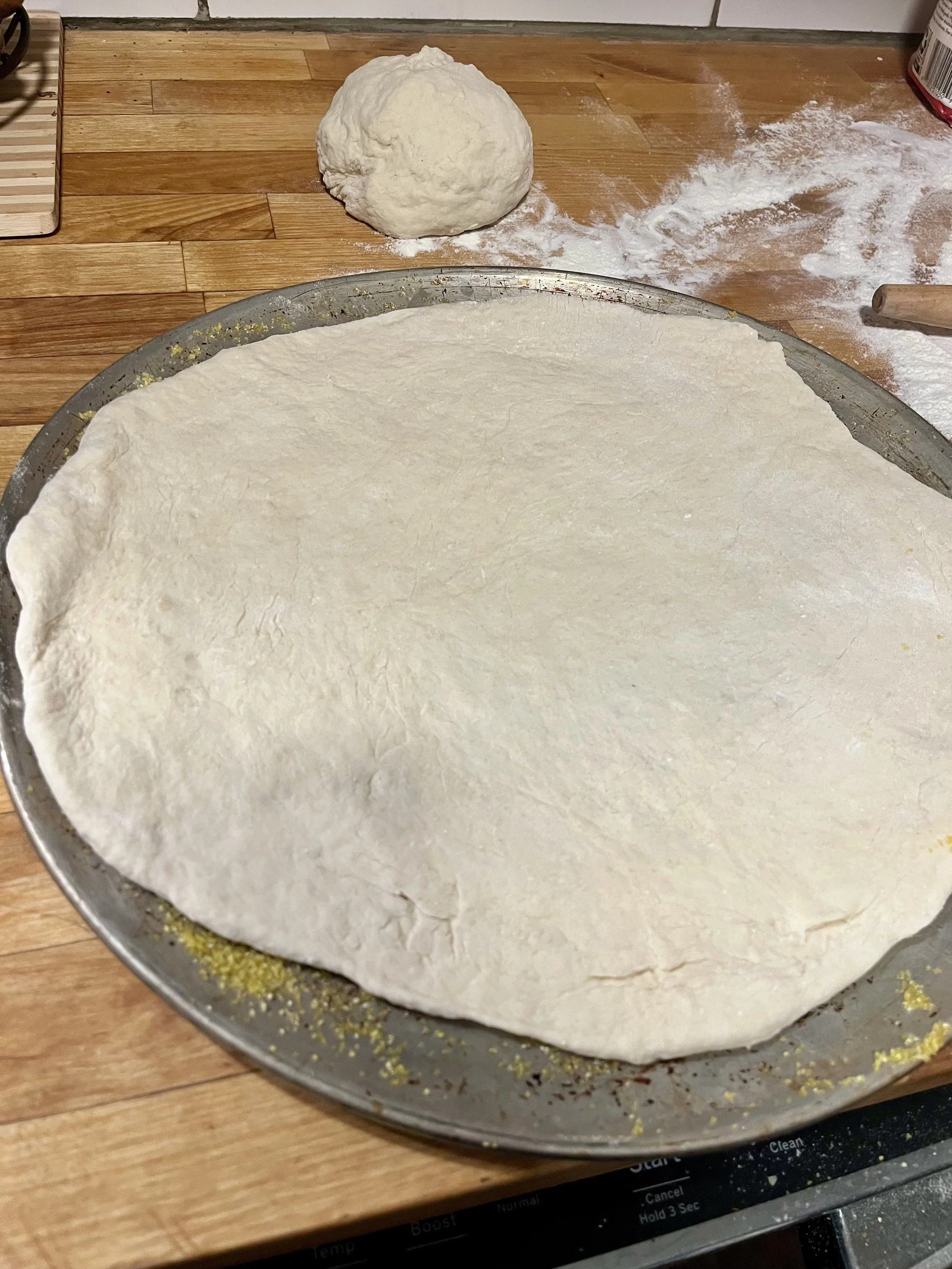 Pizza dough stretched and rolled into a round shape for Terragena Wine Mendocino Vermentino Wine Pairing and Recipes 