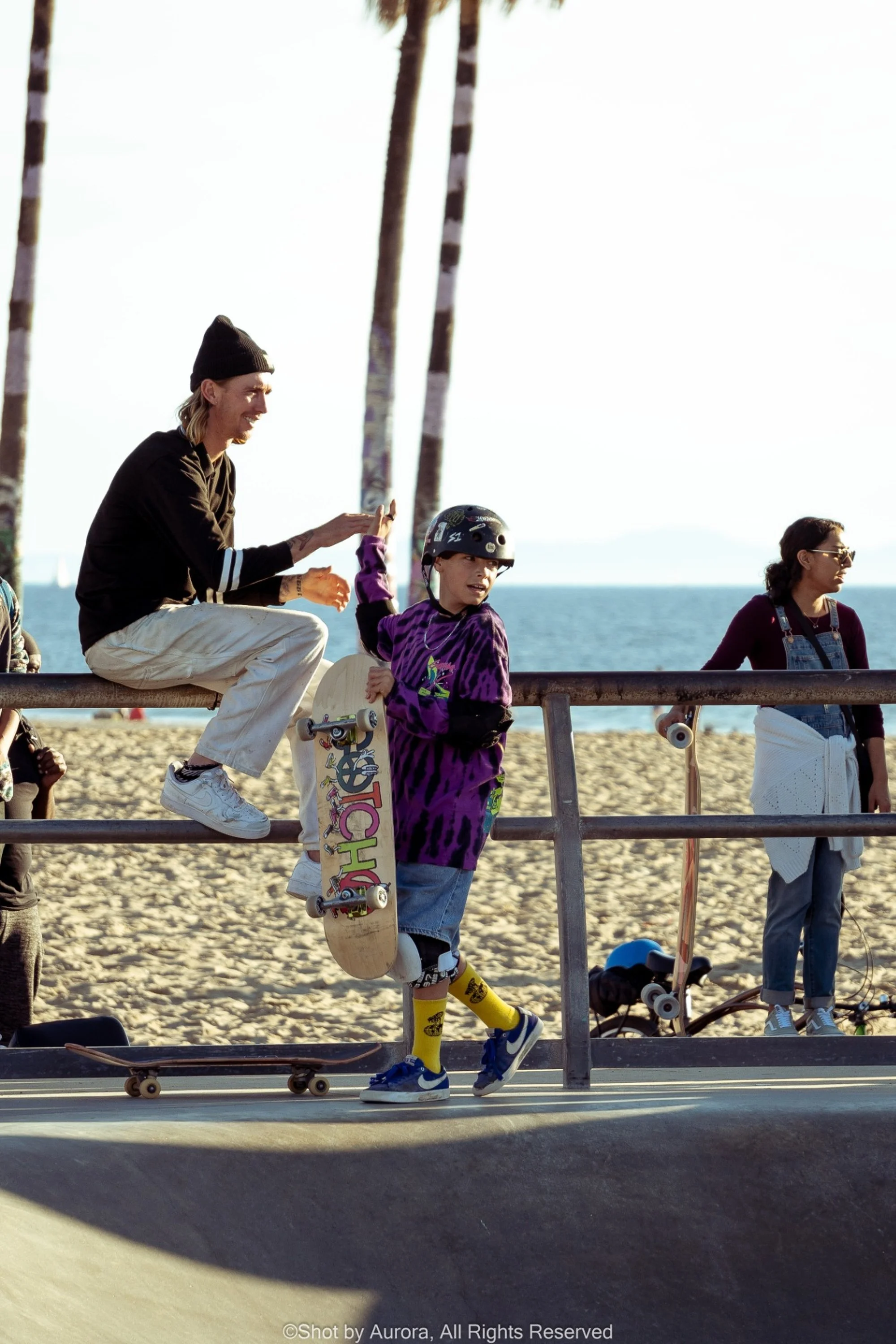 skater-boy-high-five-venice-beach-skatepark-by-aurora.jpg
