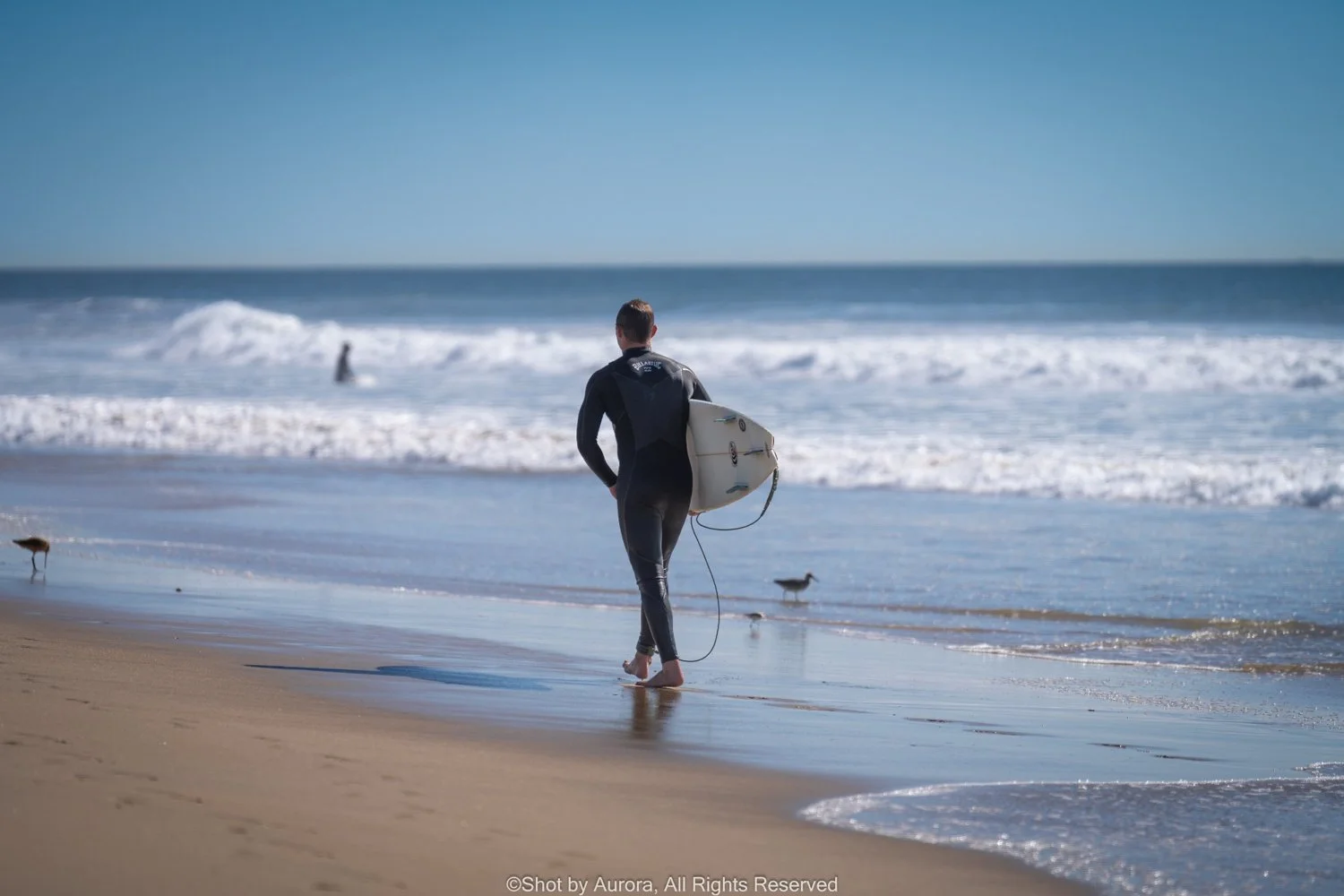 surfer-walking-beach-southern-california.jpg