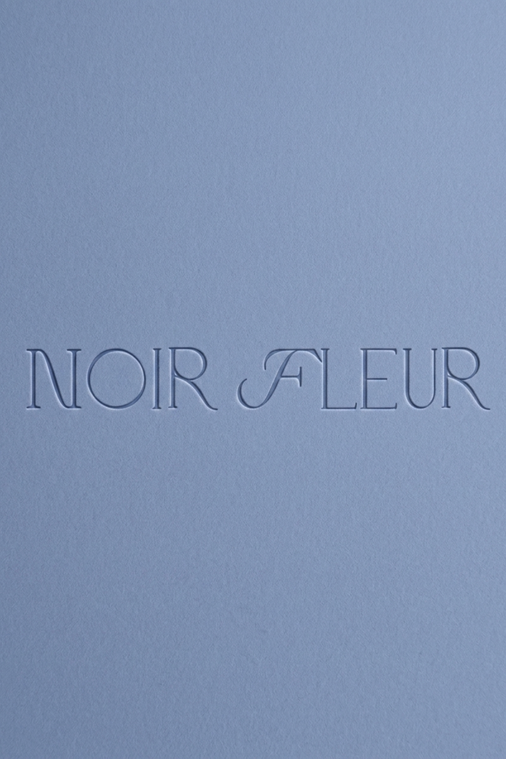 noirfleur-bluebackground.png