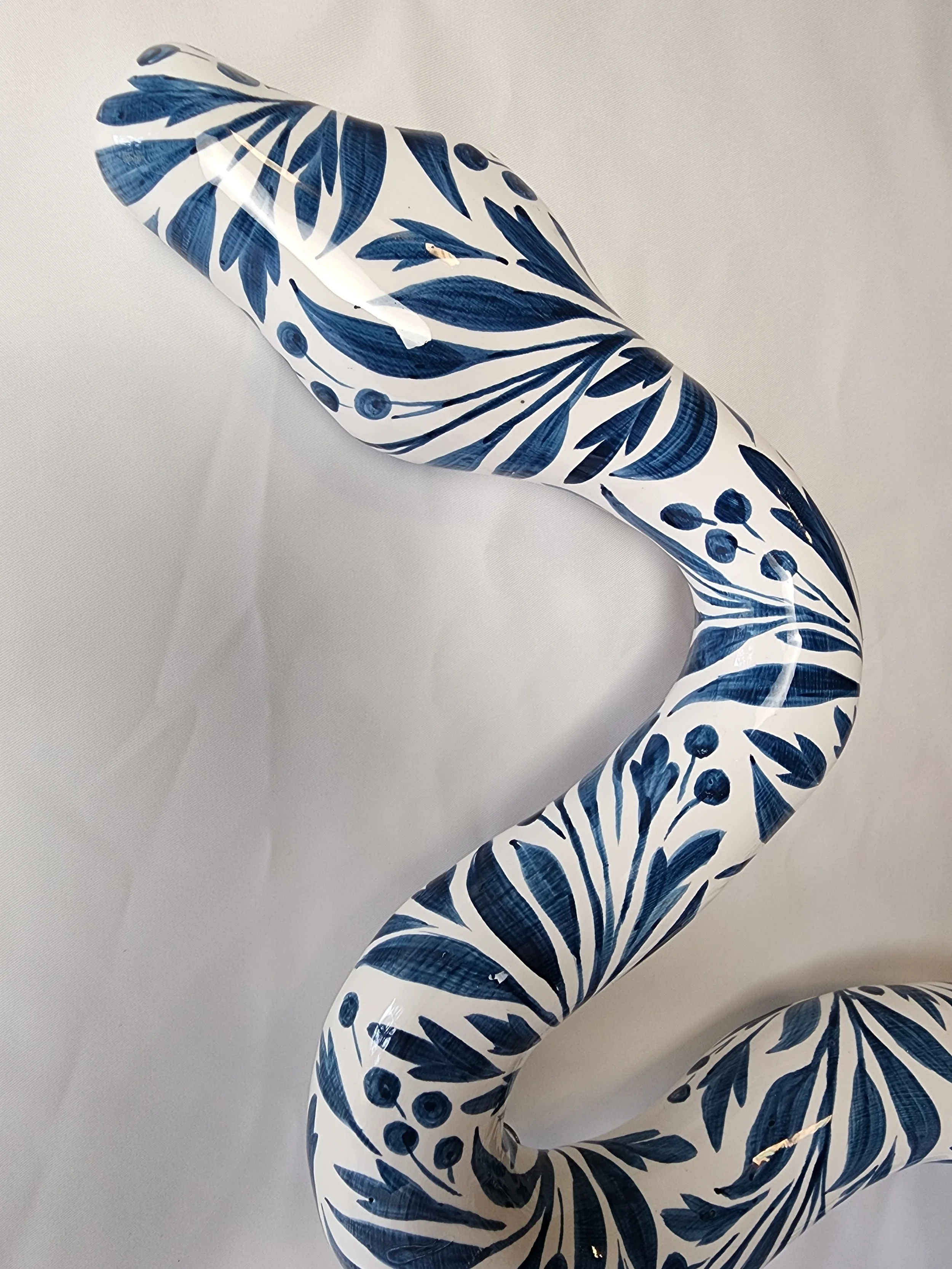 Blue and White Garden Snake #314  , 25” x 14”.