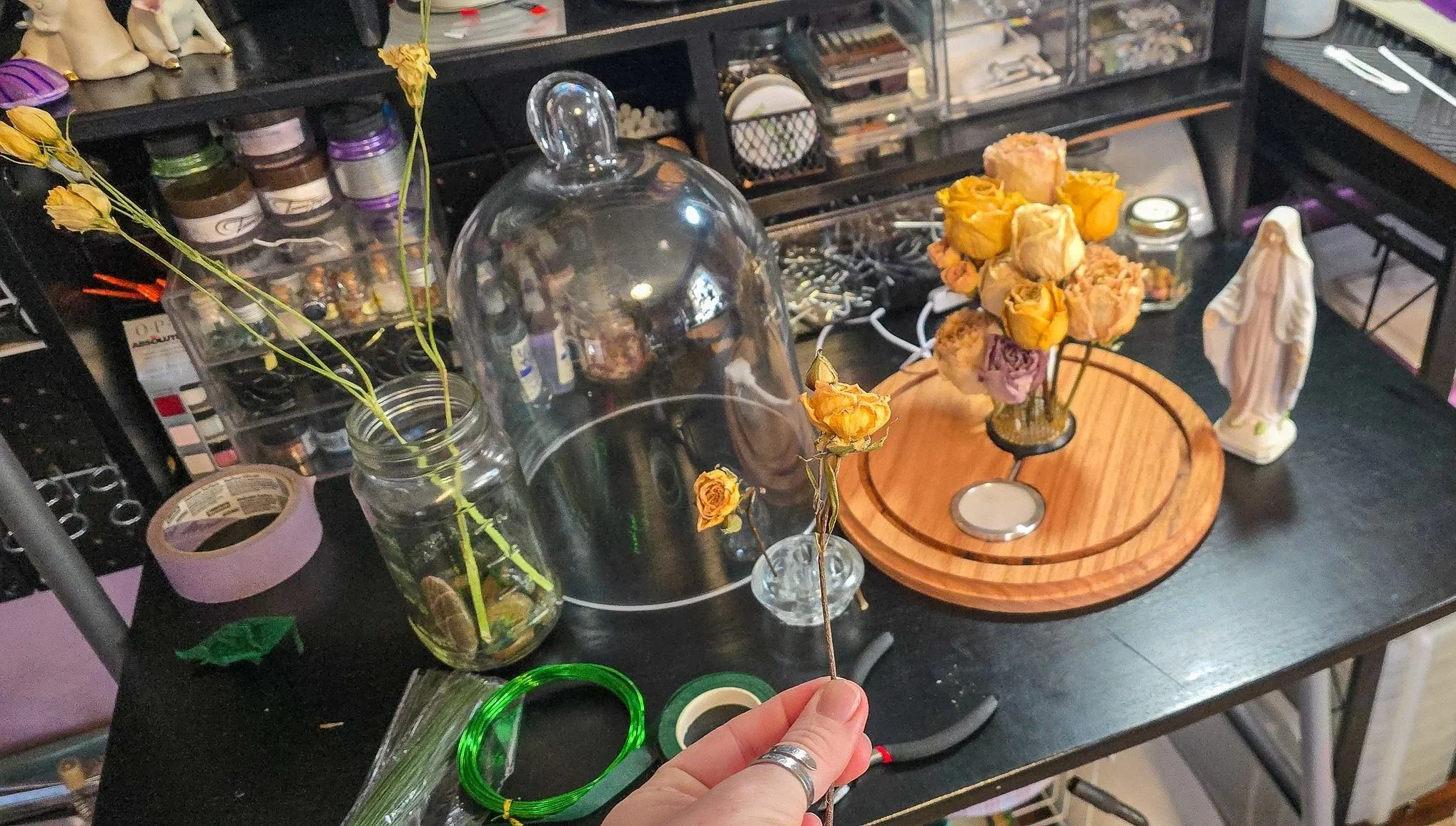 It was custom fitted with a spot for a color changing light and the flower frog to rest. Next, it was time to reserve a space for Mary and build the bouquet around her.