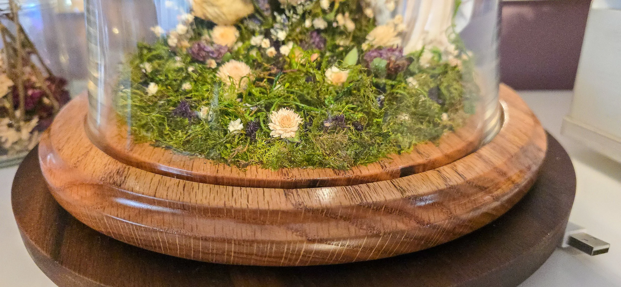 The soft moss paired with the floral colors really enhanced the overall beauty of the piece.