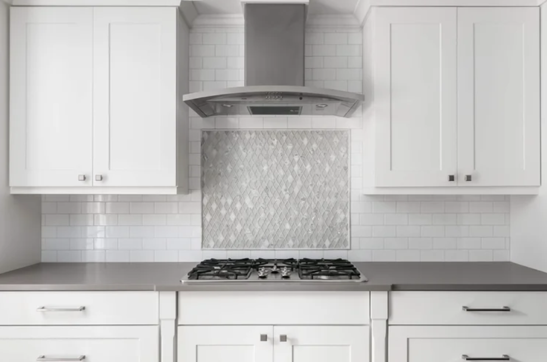 Elevated Kitchen Design: Choosing the Right Backsplash Material
