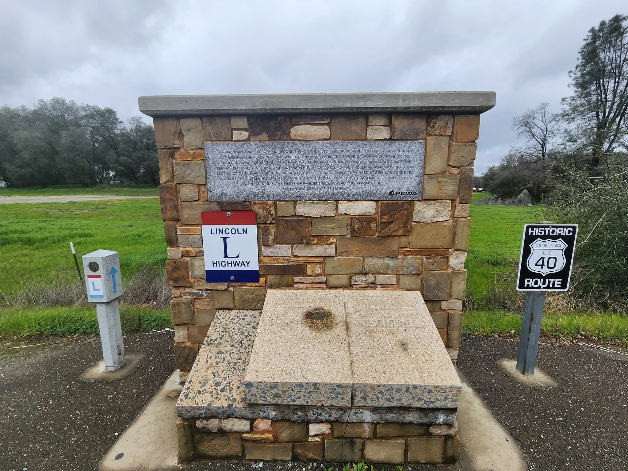 Ophir Road pavement monument