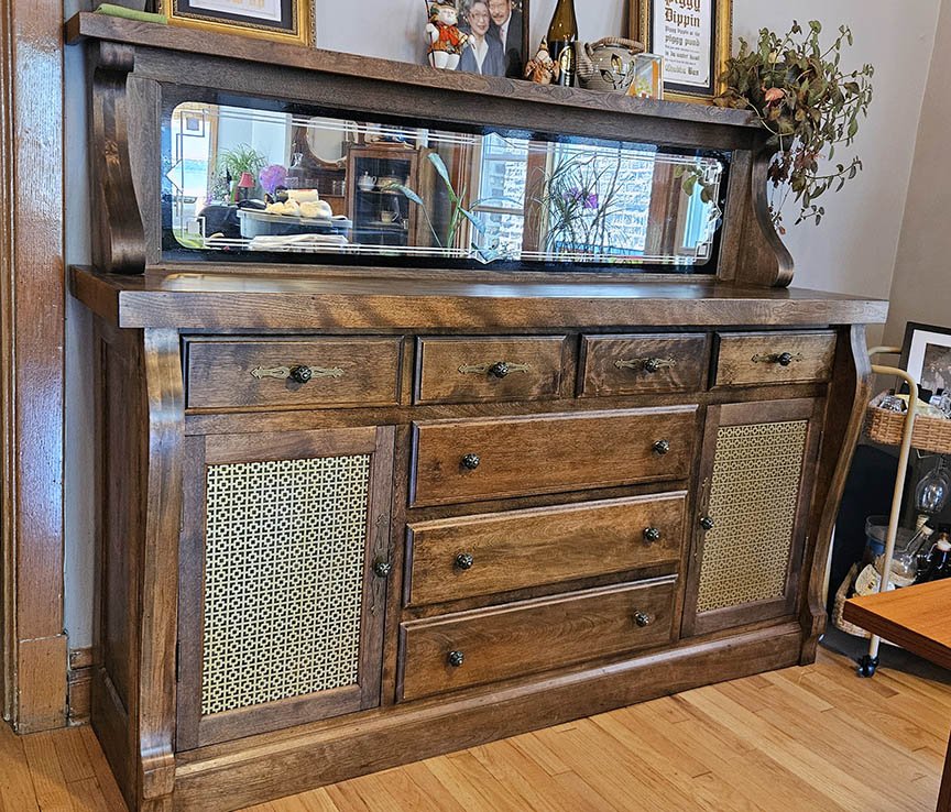 Refinished 2 piece Buffet from the 40s. All new Chestnut finish, Custom painted mirror, bronze decorative door panels, and green ceramic pumpkin pull knobs.