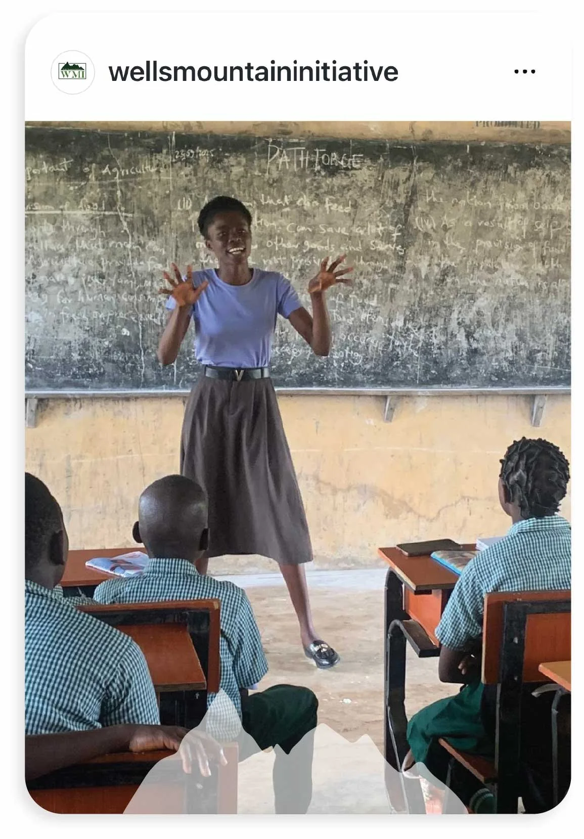 Wells Mountain Initiative teacher in classroom with students or Instagram