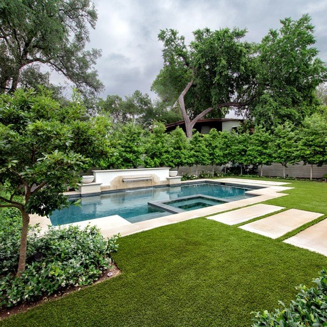 Tarrytown Chateau. Aqua Builders worked with Landscape Architecture firm @thompsonhanson to create a private retreat for a client in the Tarrytown neighborhood of Austin. The pool features include natural stone pavers, coping and fountain, a dark gre
