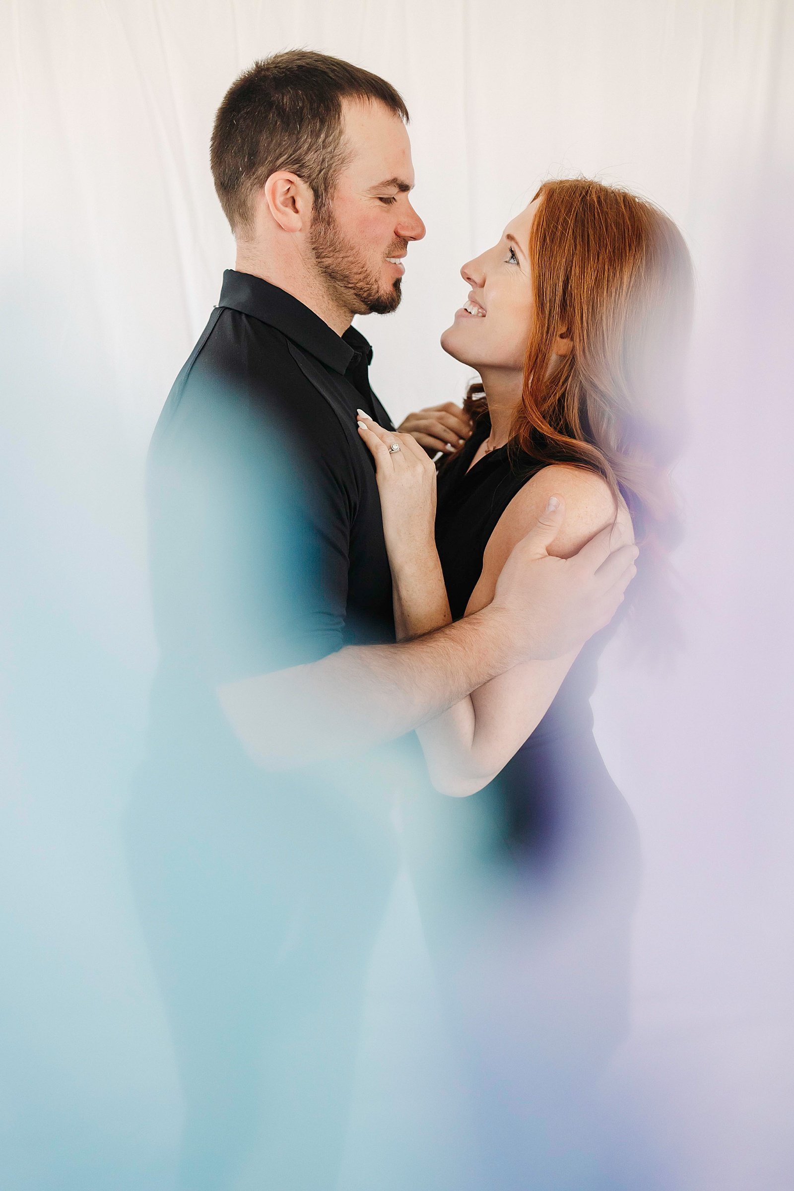  man and woman embracing with color connection couples photo session 