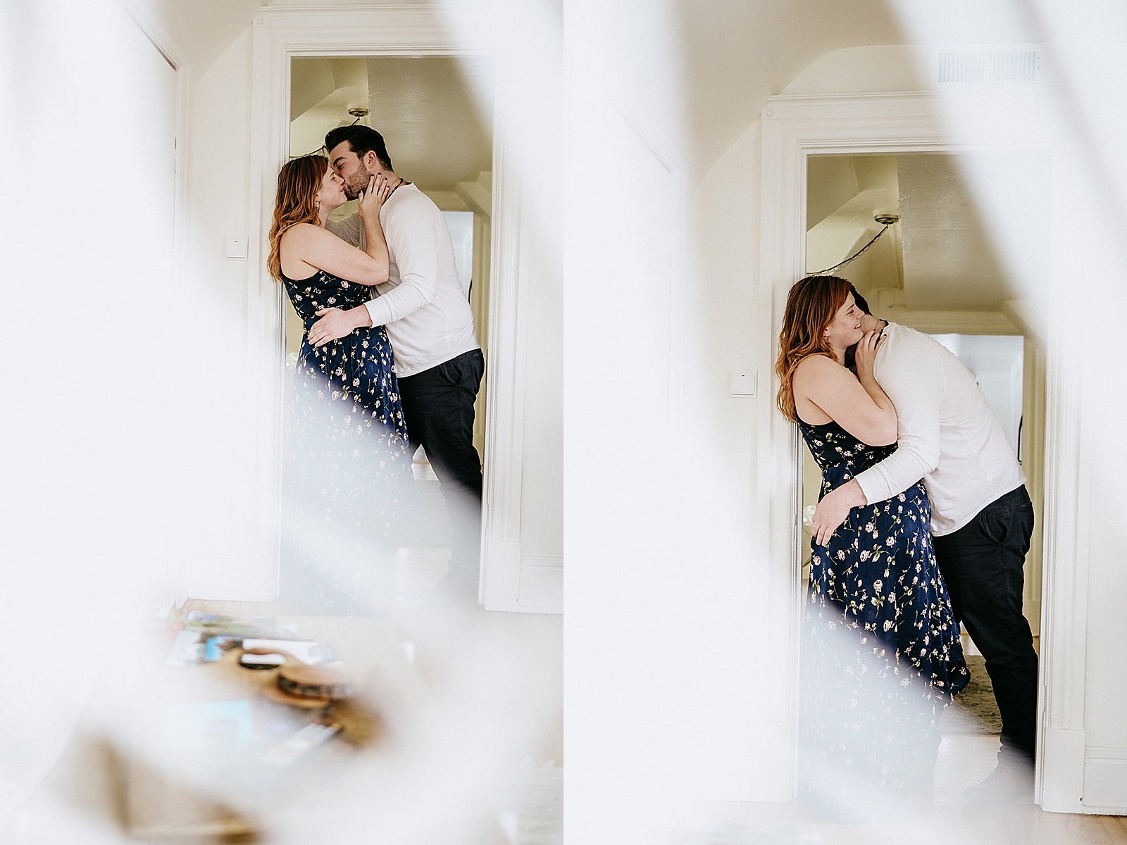  Couple kissing in a door frame for in-home couple session 