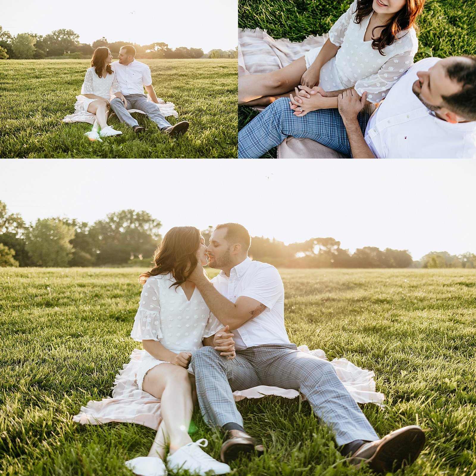  Couple kissing in the sunrise light while sitting on a blanket in a field for a picnic.  