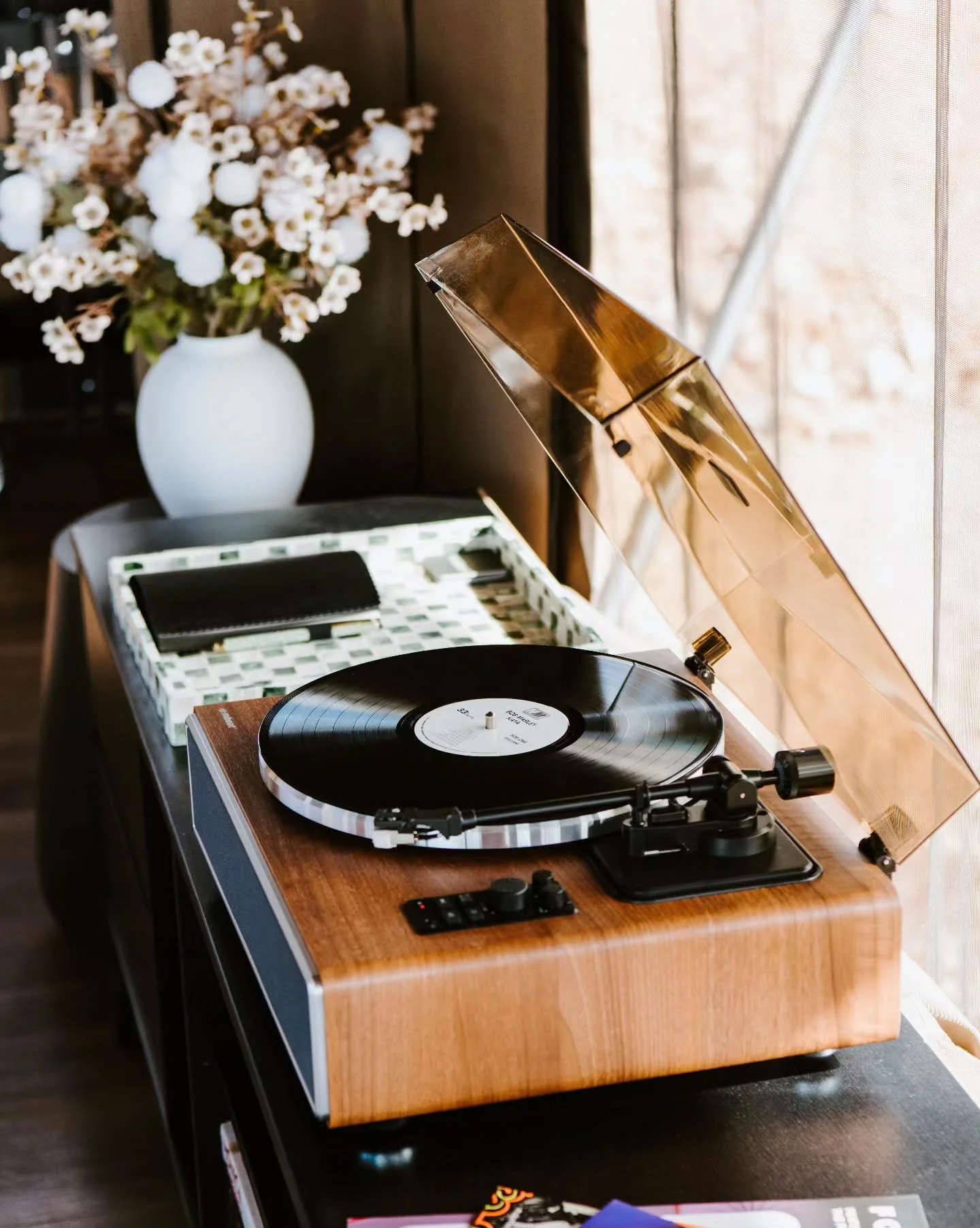 The music plays softly, never louder than the breeze or the birds. It’s simple, quietly sentimental, and the perfect backdrop for a weekend of slowing down and settling into your own rhythm.
Step into Wildnest. Put the record on. Drift in. Exh