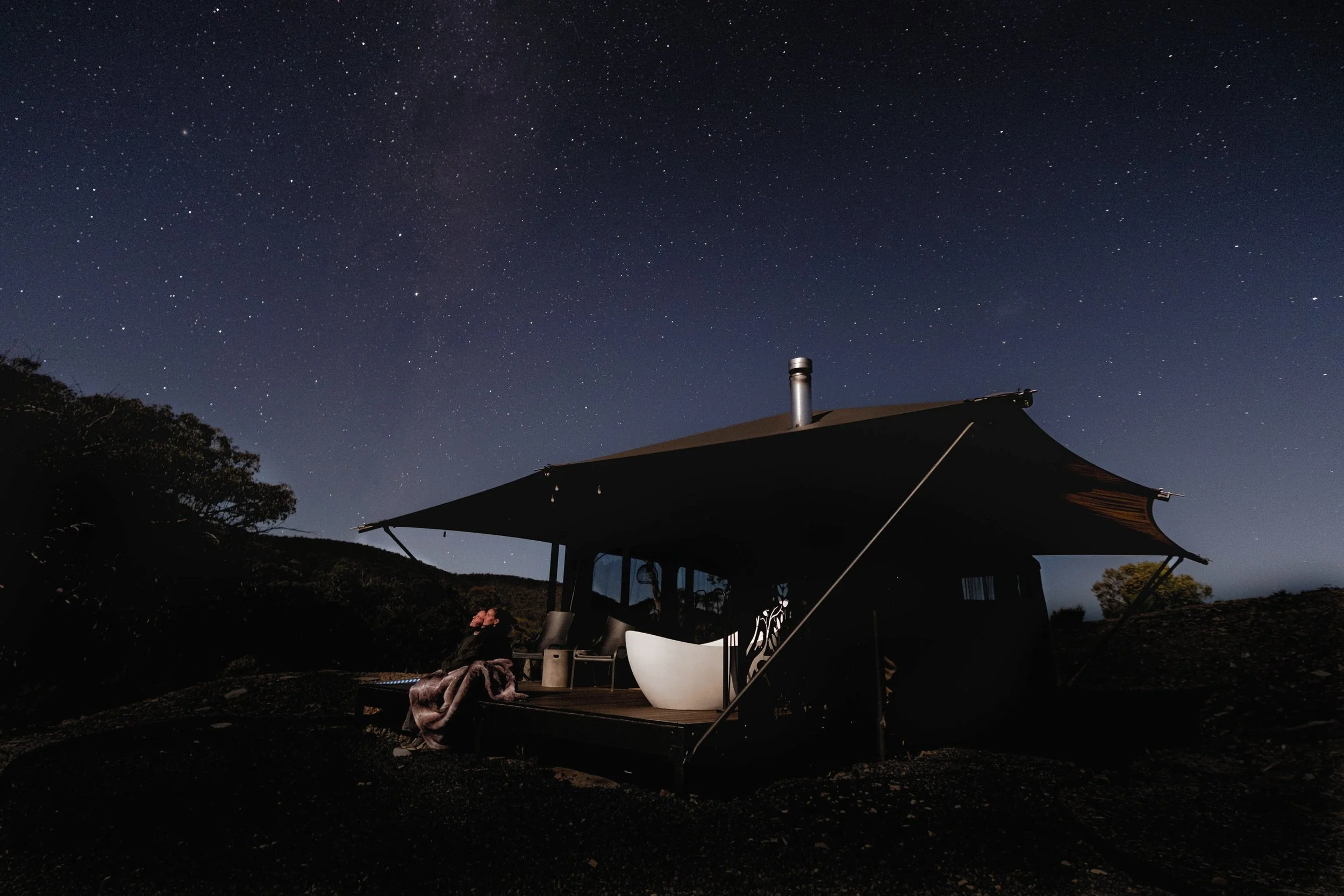 Wildnest Wilderness off-grid glamping tent near Bathurst at night